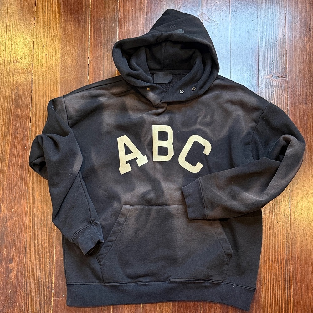 Fear of God Black Hoodie with Cream Letters